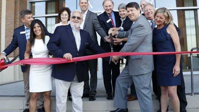 On Monday, city leaders and more than 500 people attended a ribbon cutting ceremony at the new mixed-use City Springs development, officially opening the new city hall at 1 Galambos Way.