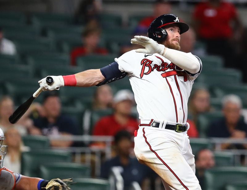 Braves Robbie Grossman hits a 3-RBI home run to cut the New York Mets lead to 6-5 during the seventh inning in a MLB baseball game on Wednesday, August 17, 2022, in Atlanta.   “Curtis Compton / Curtis Compton@ajc.com