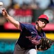Atlanta Braves pitcher Owen Murphy throws during the third inning of a spring training baseball game against the Pittsburgh Pirates Tuesday, Feb. 27, 2024, in Bradenton, Fla. (AP Photo/Charlie Neibergall)