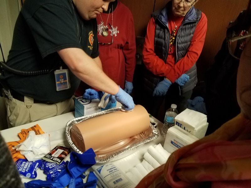 March 24, 2018: An instructor provides training as part of the “Stop the Bleed” program at the DeKalb Fire and Rescue administration building. Photo: Jennifer Peebles/AJC