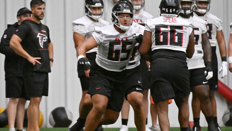 Falcons guard Matthew Bergeron (65) and Atlanta Falcons offensive tackle Bryson Speas (66) participate in a drill during rookie minicamp at Atlanta Falcons Training Facility, Friday, May 12, 2023, in Flowery Branch. (Hyosub Shin / Hyosub.Shin@ajc.com)