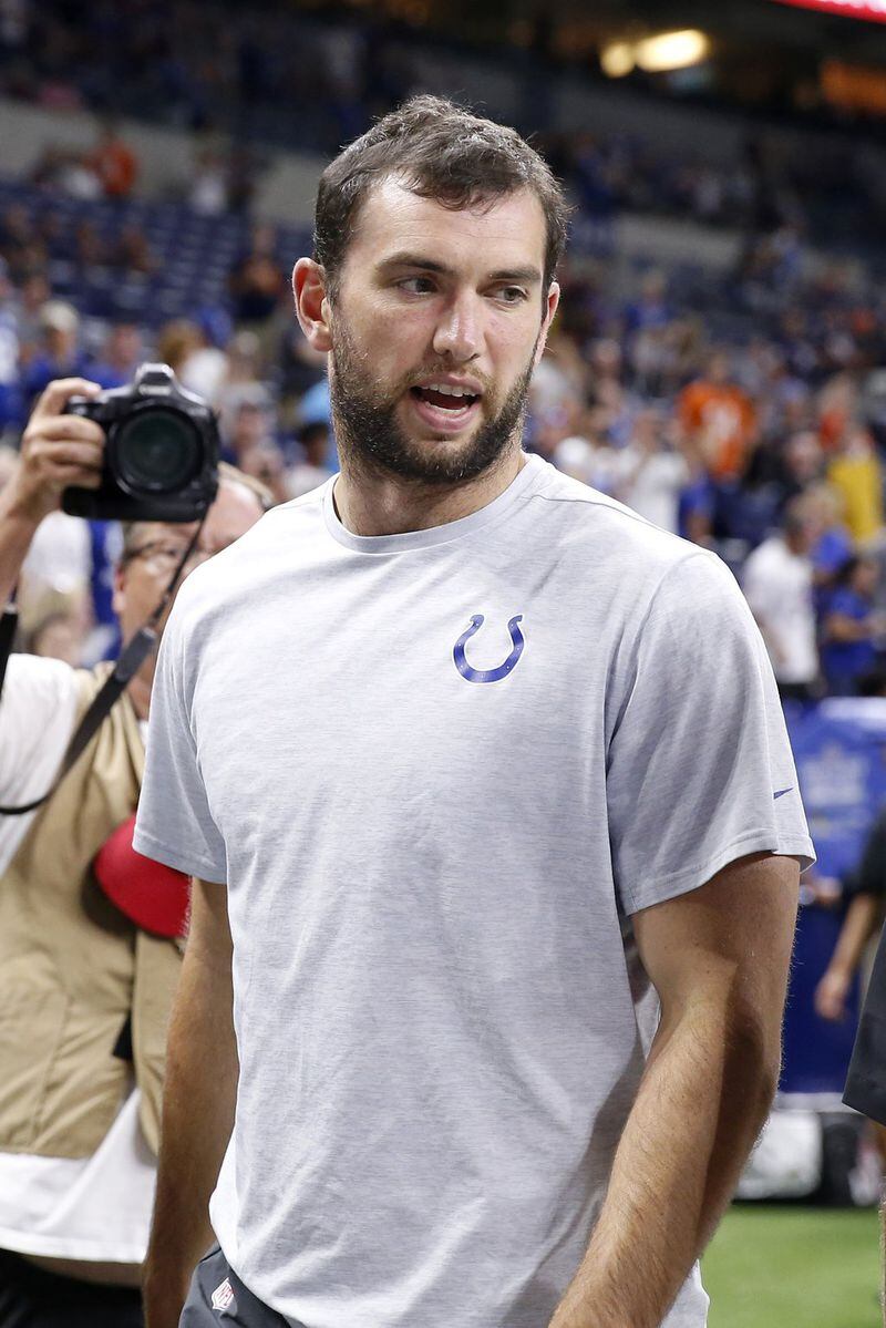 Colts quarterback Andrew Luck walks off the field after the Colts-Bears preseason game after it was reported that he would be retiring at Lucas Oil Stadium on Aug. 24, 2019, in Indianapolis. JUSTIN CASTERLINE / GETTY IMAGES