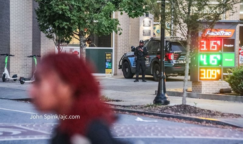 An Atlanta police officer is seen near Georgia State University. President M. Brian Blake said officers would be increasing patrols in the area after a shooting near campus.