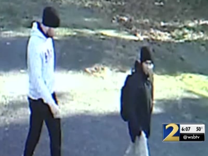 Cobb authorities are trying to find these two men who are accused of trying to rob a Marietta travel agency at gunpoint Sunday afternoon. (Photo: Channel 2 Action News)