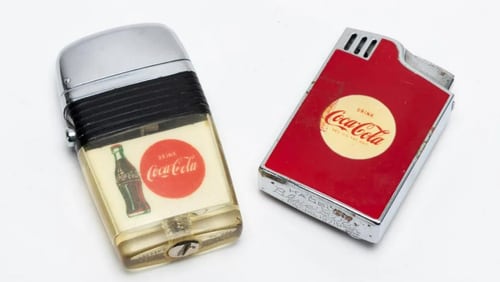 More than 400 lots are featured in the online auction, including a group of Coca-Cola lighters. (LiveAuctioneers.com)