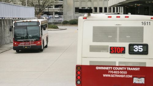 Gwinnett County Transit buses travel through the bus loading area at the Doraville MARTA Transit Station in Doraville. (ALYSSA POINTER/ALYSSA.POINTER@AJC.COM) AJC FILE PHOTO