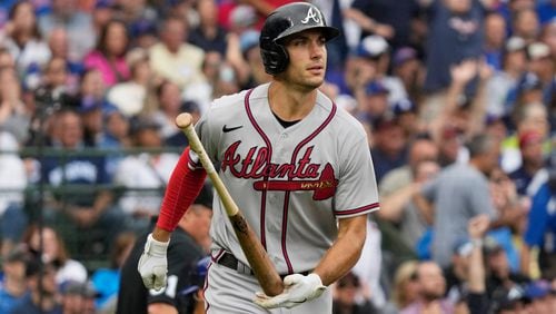 Atlanta Braves' Matt Olson flips his bat after hitting a two-run home run against the Chicago Cubs during the third inning of a baseball game in Chicago, Sunday, Aug. 6, 2023. (AP Photo/Nam Y. Huh)