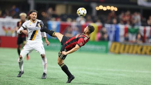 September 20, 2017 Atlanta. Hector Villalba rejects the ball in a play during the first half against LA Galaxy miedfielder Jermaine Jones.