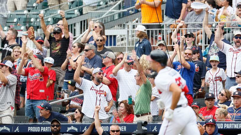 Crowds cheer after Atlanta Braves' first baseman Matt Olson (28) hits an RBI homerun during the first inning against Houston Astros at Trust Park on Sunday, August 21, 2021. Miguel Martinez / miguel.martinezjimenez@ajc.com