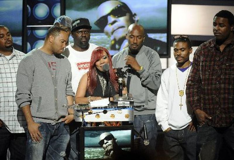 In 2009, Clay Evans (third from right) was among those who went on stage with Tiny (center) to accept a BET Hip Hop Awards honor on behalf of rapper T.I., who was incarcerated at the time on weapons charges. The ceremony was held at the Atlanta Civic Center. (Hyosub Shin / Hyosub.Shin@ajc.com)