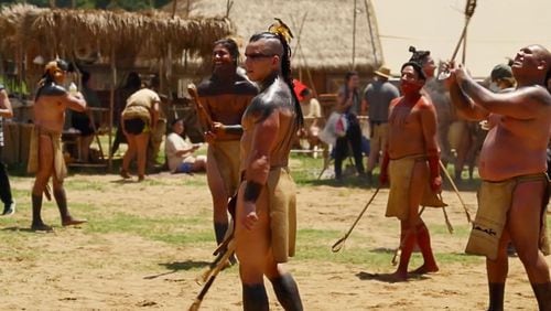 Ryker Sixkiller, center foreground, portrays a Cherokee athlete playing stickball in the Marvel “Echo” television series. The stuntman is proud the acting gig allowed him to travel to the elaborate film set in Georgia and help bring to the screen a sport his Cherokee ancestors played here. Sixkiller didn’t have to pretend, as he competes for two stickball teams back home in Oklahoma. Photo courtesy of Ryker Sixkiller.