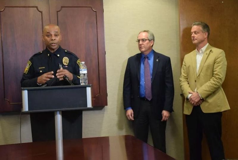 When Lawrenceville Acting Police Chief Myron Walker held a press conference at headquarters on Feb. 10, Mayor David Still (center) and City Manager Chuck Warbington stood at his side. Meanwhile, a captain who came forward with sexual harassment allegations fears being fired if she speaks publicly. (Curt Yeomans / Gwinnett Daily Post)