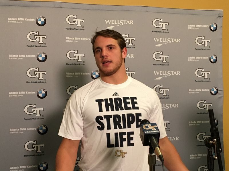 Georgia Tech linebacker Brant Mitchell conducts an interview in April in an Adidas t-shirt provided to the team during spring practice. (AJC photo by Ken Sugiura)