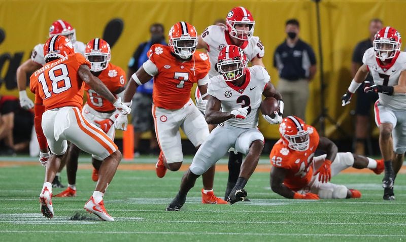 Georgia tailback Zamir White breaks loose for a long first down run against Clemson during the second half in a NCAA college football game on Saturday, Sept 4, 2021, in Charlotte.    “Curtis Compton / Curtis.Compton@ajc.com”