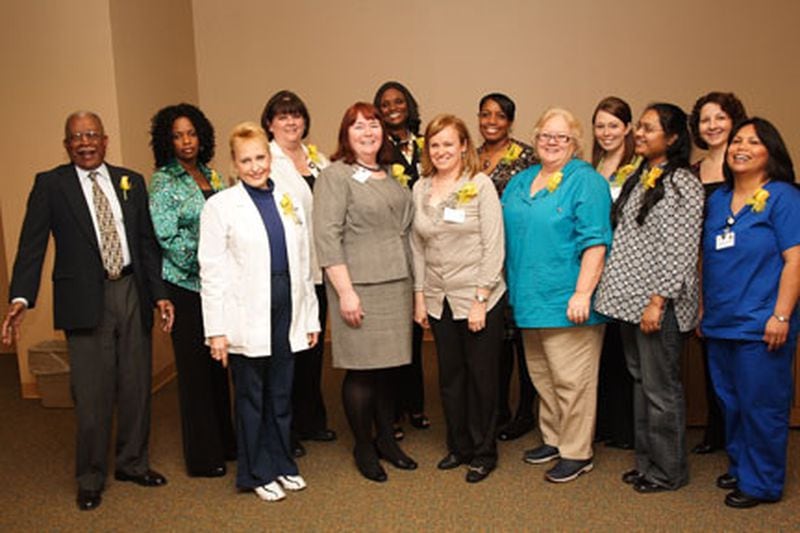 DeKalb Medical recently graduated the first class of delegates to the Center for Nursing Practice: (front row from left) Donna Brandon, Barbara O’Regan, Regina Duncan, JoAnn Davis, Jessy Joseph and Agnes DeGuia. Cyprian Vicars, Audery Henderson-Williams, Amanda Jones, Valerie Campbell, Andrea Wilkins, Leah Tollison and Ana Rickett are on the back row.