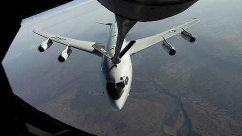 A U.S. Air Force photo of an E-8C Joint Surveillance Target Attack Radar System (JSTARS) receiving fuel from a KC-135 tanker plane in 2004. (U.S. Air Force via The New York Times)