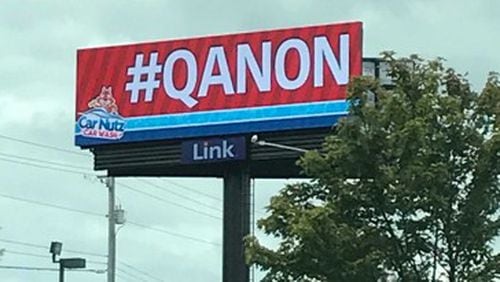 Cobb car wash put up billboard linking business to QAnon conspiracy