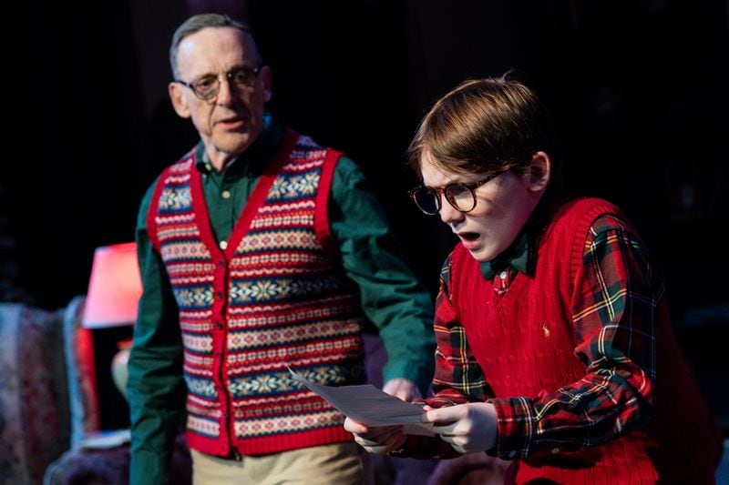 Tom Key, left, as the Narrator, and Max Walls share the role of Ralphie Parker in the stage version of “A Christmas Story” at Theatrical Outfit.