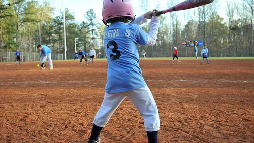 Johns Creek has awarded a $644,422 contract to install artificial turf on baseball infields at Ocee Park. AJC FILE