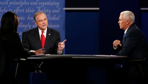 Republican vice-presidential nominee Gov. Mike Pence, right, and Democratic vice-presidential nominee Sen. Tim Kaine debate during the vice-presidential debate at Longwood University in Farmville, Va., Tuesday, Oct. 4, 2016. (AP Photo/Steve Helber)