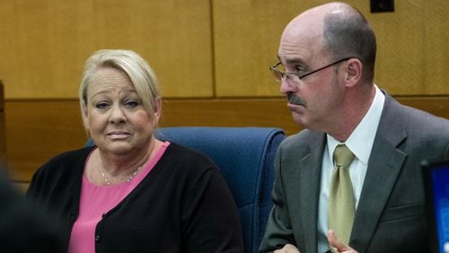 Former housekeeper for Rogers, Mye Brindle (L), and attorney Reid Thomson in the Fulton County Courthouse Wednesday, April 4, 2018. STEVE SCHAEFER / SPECIAL TO THE AJC