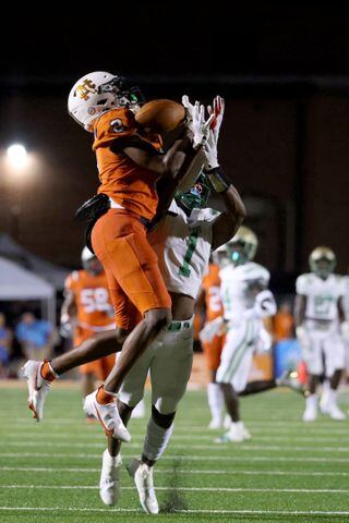 August 20, 2021 - Kennesaw, Ga: North Cobb defensive back Marquis Groves-Killebrew (2) deflects a pass intended for Buford wide receiver Isaiah Bond (1) during the first half at North Cobb high school Friday, August 20, 2021 in Kennesaw, Ga.. JASON GETZ FOR THE ATLANTA JOURNAL-CONSTITUTION