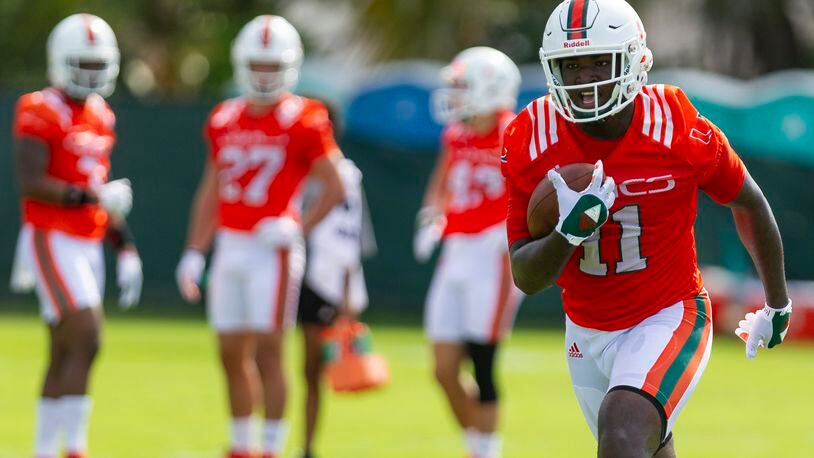 University of Miami wide receiver Marquez Ezzard (11) runs a drill during the first day of fall training camp at the Greentree Practice Fields in Coral Gables on Saturday, August 4, 2018.