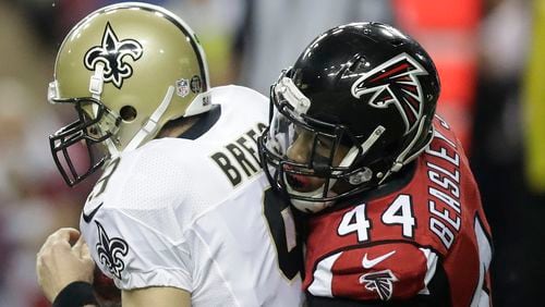 Vic Beasley (44) returned to the game and recorded a sack of  New Orleans Saints quarterback Drew Brees (9) on the final play of  the first half Sunday, Jan. 1, 2017, in Atlanta.