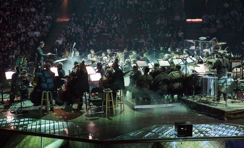 Ramin Djawadi, composer of the “Game of Thrones” soundtrack, conducts the orchestra during the “Game of Thrones: Live Concert Experience.” The show will be at Philips Arena on March 14. CONTRIBUTED BY BARRY BRECHEISEN