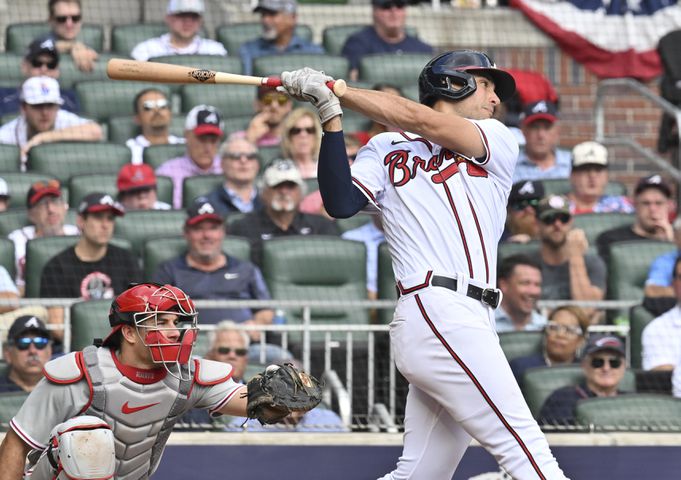 Atlanta Braves' Matt Olson singles during the third  inning of game one of the baseball playoff series between the Braves and the Phillies at Truist Park in Atlanta on Tuesday, October 11, 2022. (Hyosub Shin / Hyosub.Shin@ajc.com)