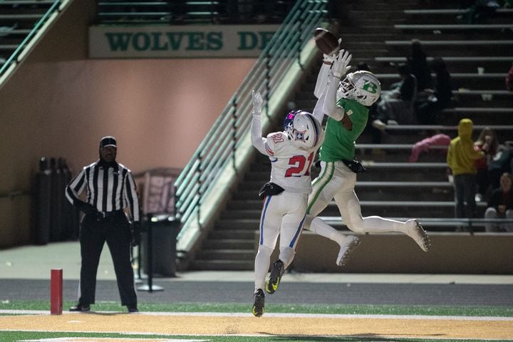 KJ Boldon, wide receiver for Buford, attempts a catch. (Jamie Spaar for the Atlanta Journal Constitution)