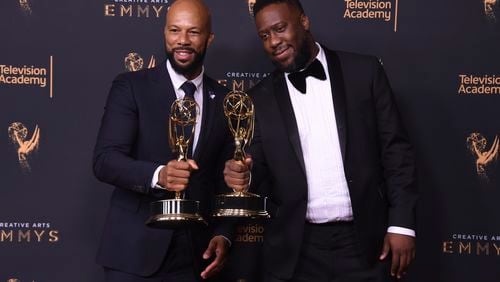 Common, left, and Robert Glasper pose in the press room with the award for outstanding original music and lyrics for "13th Song Title: Letter to the Free" during night one of the Creative Arts Emmy Awards at the Microsoft Theater on Saturday, Sept. 9, 2017, in Los Angeles. (Photo by Richard Shotwell/Invision/AP)