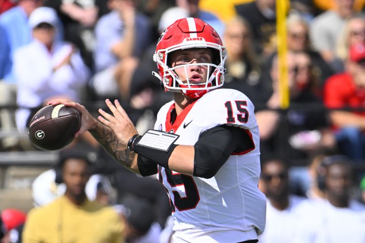 Georgia quarterback Carson Beck (15) passes against Vanderbilt during the first quarter of an NCAA football game, Saturday, Oct. 14, 2023, in Nashville, Tenn. (Special to the AJC/John Amis)