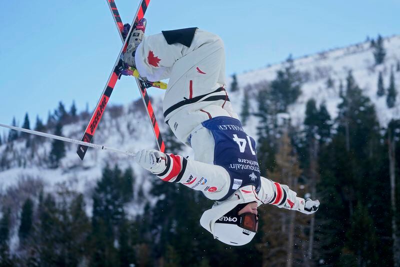 FILE - Canada's Chloe Dufour-Lapointe competes in a World Cup freestyle moguls competition at Deer Valley Resort in Park City, Utah, on Jan. 14, 2022. Salt Lake City's enduring enthusiasm for hosting the Olympics will be on full display Wednesday, April 10, 2024, when members of the International Olympic Committee come to Utah for a site visit ahead of a formal announcement expected this July to name Salt Lake City the host for the 2034 Winter Olympics. (AP Photo/Rick Bowmer, File)