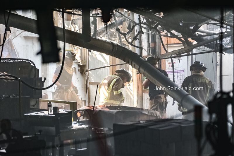Fire officials do not know what kind of materials were housed inside the DHM Adhesives mill.