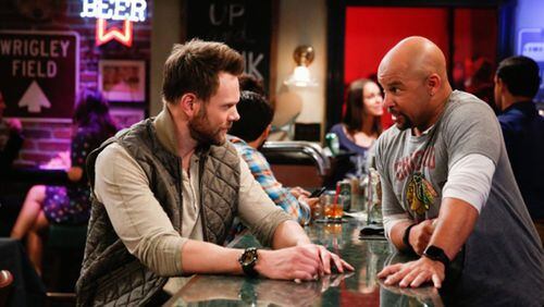 Joel McHale and Chris Williams appear in the pilot episode of CBS’s new comedy “The Great Indoors.” (CBS)