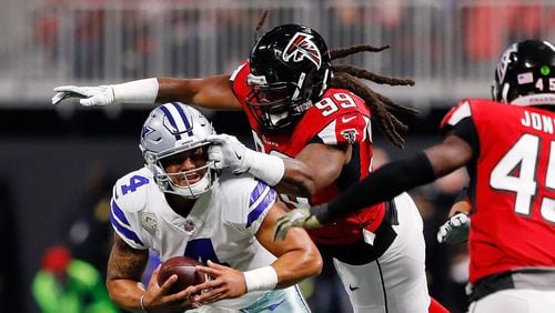 Cowboys quarterback Dak Prescott  is sacked by Falcons defensive end Adrian Clayborn  during the Falcons’ 27-7 win Sunday, Nov. 12, 2017, Mercedes-Benz Stadium  in Atlanta.