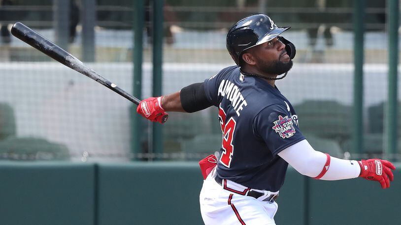 Braves' Abraham Almonte hits a leadoff triple against the Minnesota Twins during the second inning of a spring training game Tuesday, March 2, 2021, at CoolToday Park in North Port, Fla. (Curtis Compton / Curtis.Compton@ajc.com)