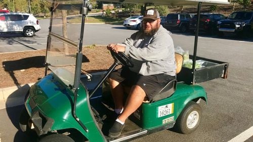 Scott Smith is the owner of the Curious Pig in Peachtree City. After working in the industry 25 years, Smith seeks quality over quantity. He finds joy in simple golf cart runs to pick up lettuce or mushrooms. His restaurant is closed two days a week, and none of his full-time employees has a second job. “I want the people who work here to be happy,” he said. LIGAYA FIGUERAS / LFIGUERAS@AJC.COM