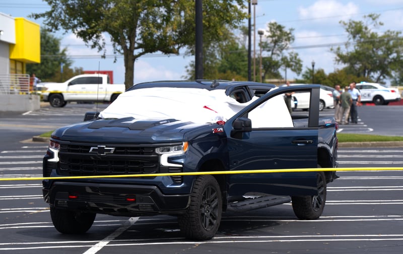 The victim was found dead in a blue Chevrolet pickup truck, Gwinnett County police said. 