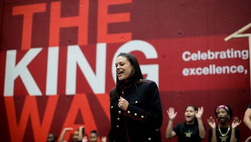 Atlanta Public Schools Superintendent Meria Carstarphen sings the song "My Shot" from "Hamilton" with students during the fund-raising leading up to this week’s outing. Photo: BRANDEN CAMP/SPECIAL