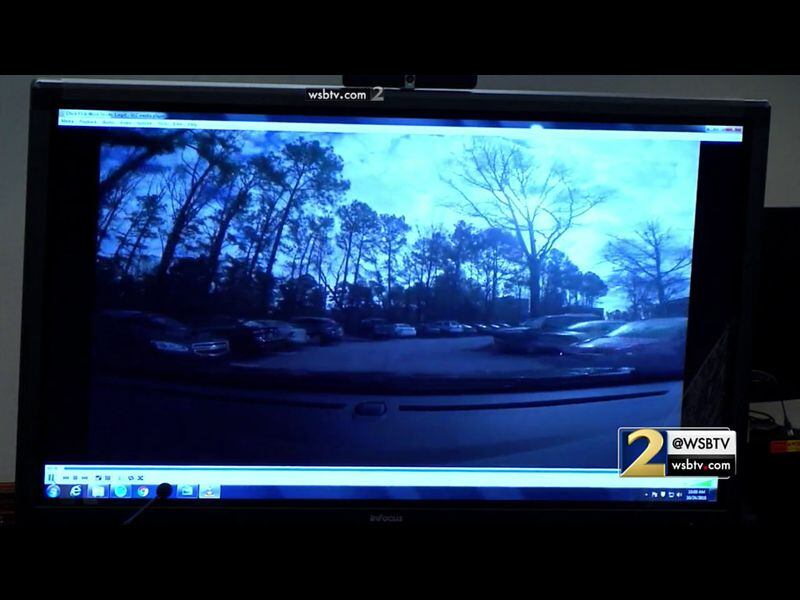 In this GoPro camera video, Cobb County lead detective Phil Stoddard demonstrates the route taken by Justin Ross Harris on the day that Cooper died. In this view, the vehicle arrives at the Home Depot Treehouse parking lot, roughly where Ross Harris parked on the morning of Cooper's death. The video was shown to the jury during murder trial of Justin Ross Harris at the Glynn County Courthouse in Brunswick, Ga., on Monday, Oct. 24, 2016. (screen capture via WSB-TV)