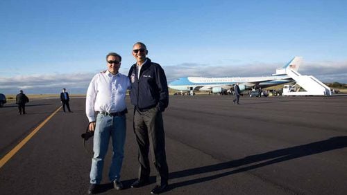 Usually one of them was photographing the other. But in this photo on an official trip, Chief Official White House Photographer Pete Souza and President Barack Obama posed together with the nose of Air Force One visible in the background. CONTRIBUTED BY WHITE HOUSE PHOTO OFFICE