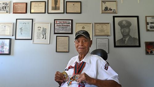 October 2, 2020 Keysville - Portrait of Daniel Boatwright wearing medals speaks at his home in Keysville on Friday, October 2, 2020. Daniel Boatwright is one of the oldest surviving members of the 555th paramilitary infantry division, also known as the Triple Nickles. (Hyosub Shin / Hyosub.Shin@ajc.com)