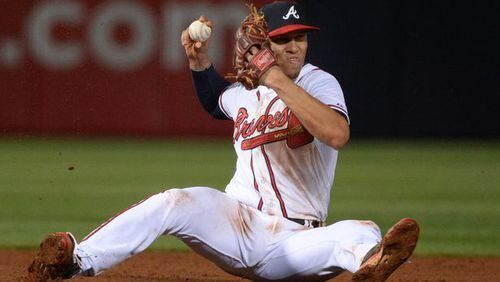 Braves shortstop Andrelton Simmons has already established himself as the best defensive shortstop in baseball and the best since Ozzie Smith and Omar Vizquel. (AJC file photo)