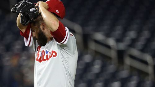 Pitcher Adam Morgan #46 of the Philadelphia Phillies reacts after allowing a home run to Wilmer Difo #1 of the Washington Nationals during the sixth inning at Nationals Park on August 21, 2018 in Washington, DC. (Photo by Patrick Smith/Getty Images)
