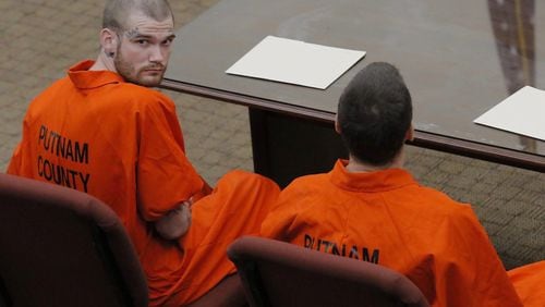 Ricky Dubose (left) and Donnie Russsell Rowe sit before a judge in the Putnam County courthouse in Eatonton on Wednesday, June 21, 2017. The pair is accused of killing two correctional officers while escaping from a prison transport bus. A state prosecutor said Wednesday that he will seek the death penalty against them. They were denied bond. (BOB ANDRES/AJC)