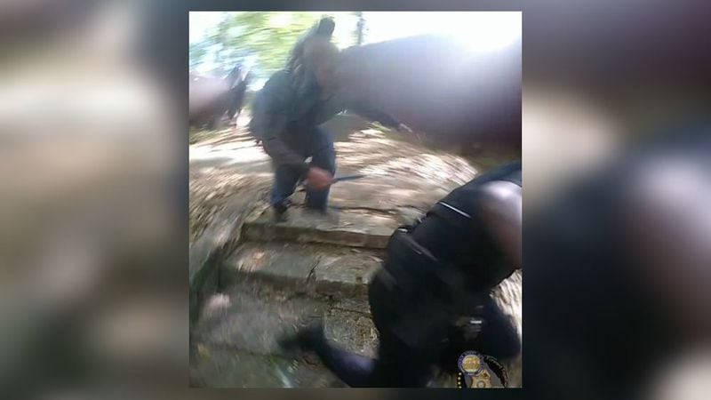 Body camera footage appears to show Matthew Williams run toward police with a knife before he was killed.