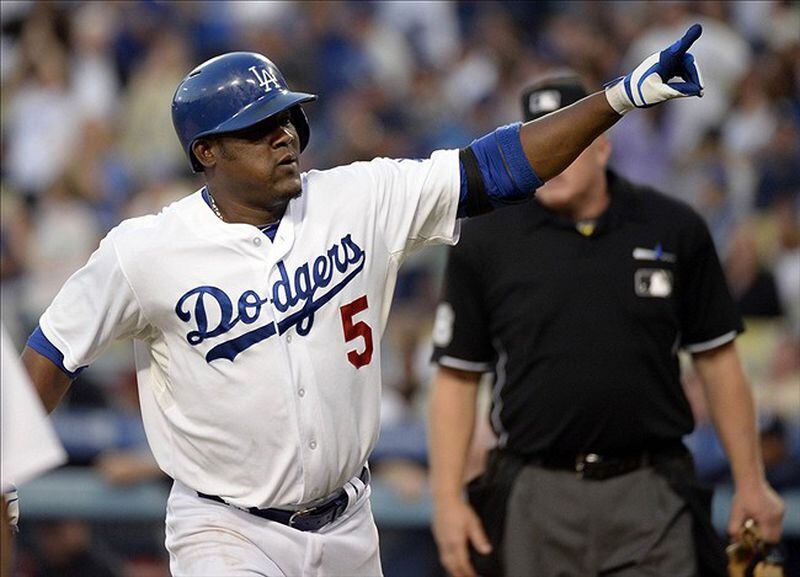 The Braves traded for Juan Uribe, an immensely popular Dodgers player who hit the decisive homer to beat them in the 2013 division series. (AP photo)