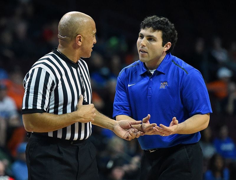 LAS VEGAS, NV - NOVEMBER 28: Head coach Josh Pastner of the Memphis Tigers talks with a referee during a timeout in the team's game against the Indiana State Sycamores during the 2014 Continental Tire Las Vegas Invitational basketball tournament at the Orleans Arena on November 28, 2014 in Las Vegas, Nevada. Memphis won 72-62. (Photo by Ethan Miller/Getty Images)